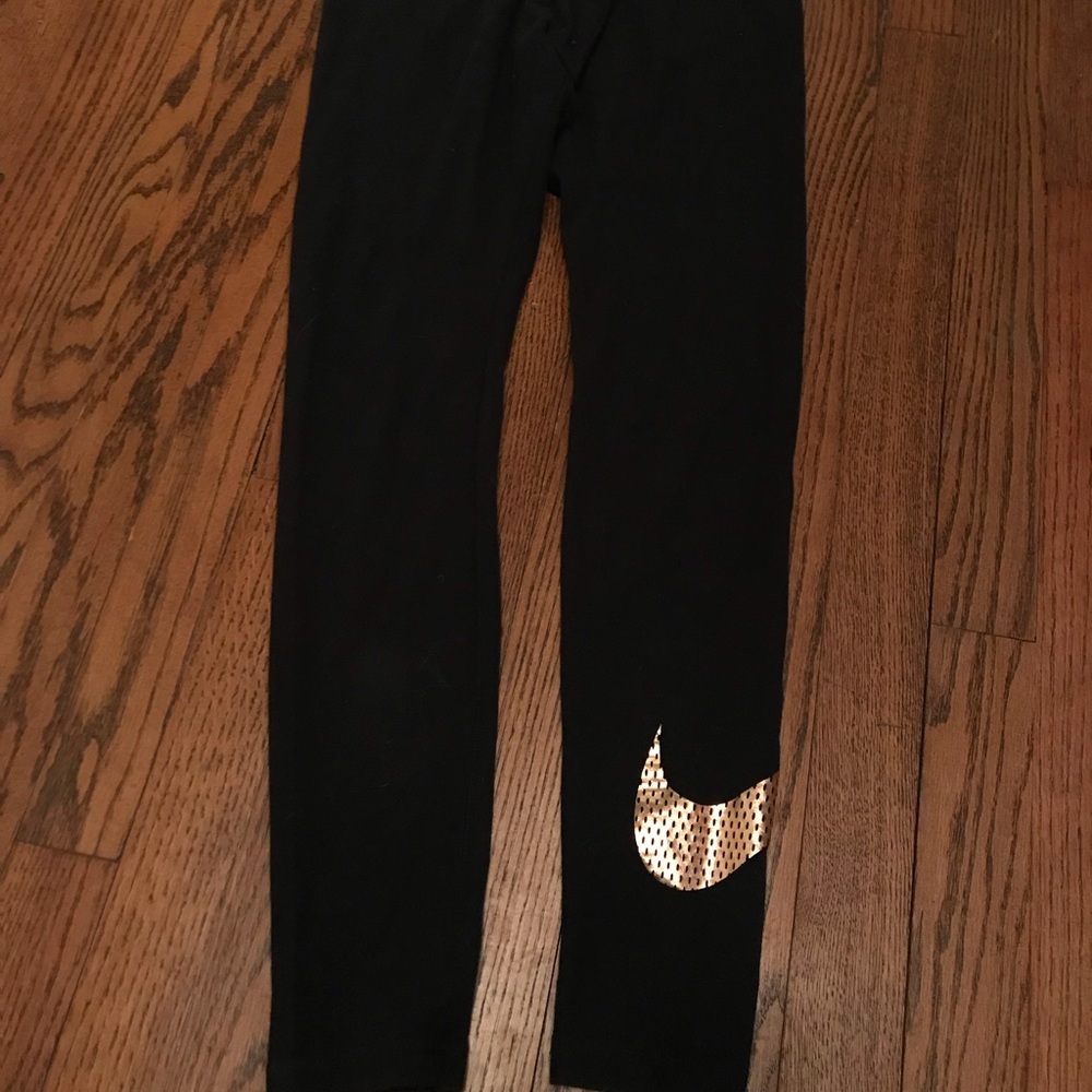 NIKE rose gold swoosh leggings